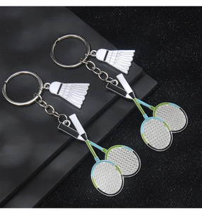 Detail of badminton shuttlecock and dual-color racket charms on metal keyrings