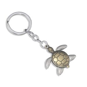 Portachiavi vintage a forma di tartaruga in bronzo e argento con dettagli incisi