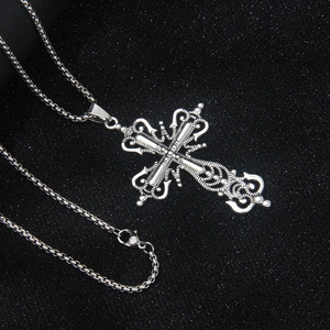 Vintage silver gothic cross pendant necklace with engraved details and steel box chain
