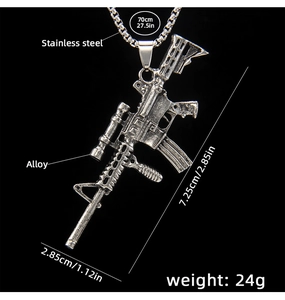 Detail view showing dimensions of a vintage silver rifle pendant with 70cm chain