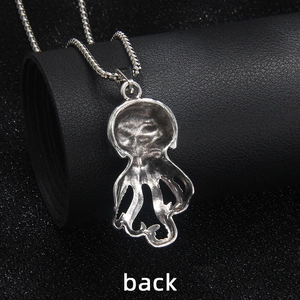 Gothic octopus pendant necklace in vintage silver finish with box chain, back view display