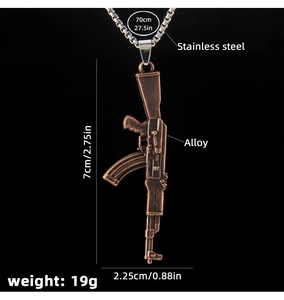 Detailed size view of retro bronze AK-47 rifle pendant with stainless steel chain