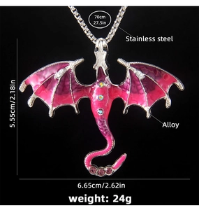 Detail of dragon pendant with pink enamel wings and sparkling rhinestones on steel chain
