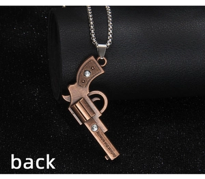 Macro view showing the back detail of a bronze revolver pendant with a stainless chain