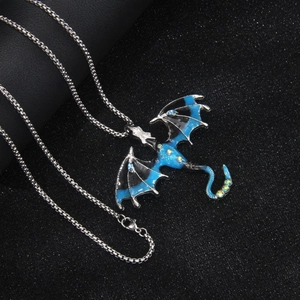 Gothic dragon necklace with blue enamel wings and sparkling crystals on silver chain