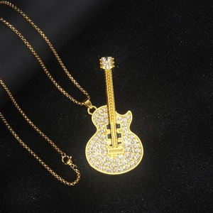Gold-plated stainless steel guitar necklace with sparkling pavé crystal embellishments