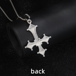 Back view of silver stainless steel gothic cross pendant with fine radial textures on bead chain