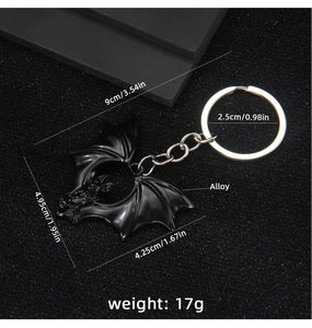 Detailed size specifications of the black gothic bat keychain in polished alloy