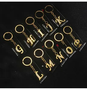 Detailed size specifications for gold letter keychains G to P with inlaid rhinestones