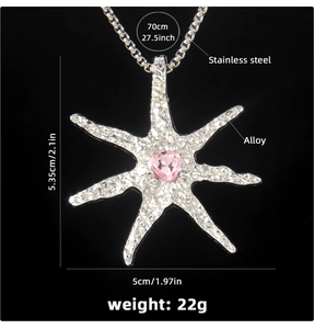 Detailed view of starfish pendant with pink heart gemstone and measurement marks