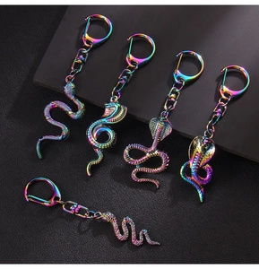 Macro detail of assorted iridescent snake keychains with colorful metallic finish