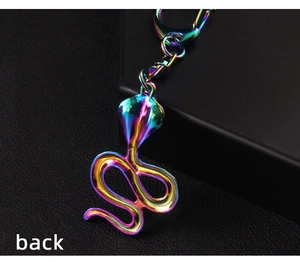 Macro view of rainbow electroplated cobra keychain showing vibrant back details