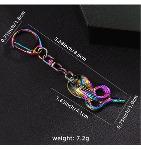 Macro view of iridescent cobra keychain with D-shaped clasp and measurement dimensions