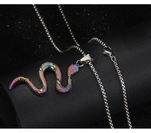 Macro shot of colorful rainbow cobra snake pendant with detailed scales and box chain