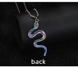 Detail view of the rainbow iridescent snake pendant back with fine scale texture