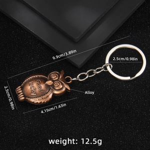Vintage bronze alloy owl keychain with Good Lucky engraving and dimensions for bags