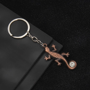 Porte-clés lézard en bronze avec cristal étincelant et finition métallique texturée