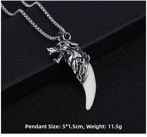 Close-up of wolf head pendant and fang necklace with 5x1.5cm size and 11.5g weight detail