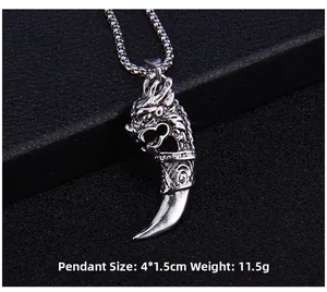 Detailed view of silver dragon head tooth pendant with size 4x1.5cm and 11.5g weight
