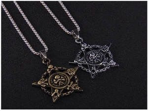 Detailed view of Gothic pirate skull pentagram pendant in antique bronze and black finishes