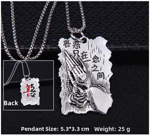 Detail of silver pendant showing double prayer hands and 5.3x3.3cm size dimensions