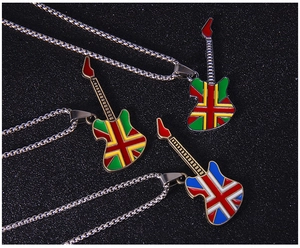 Macro detail of electric guitar pendants with Union Jack pattern and punk box chains