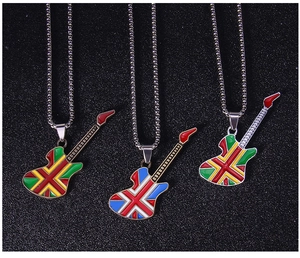 Detailed macro view of electric guitar pendants with colorful enamel Union Jack patterns