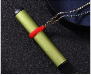 Detail of green electronic device with red silicone ring and colorful metal neck chain