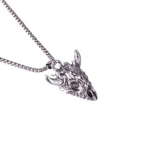 Gothic silver skull pendant necklace with hexagram symbol on white background