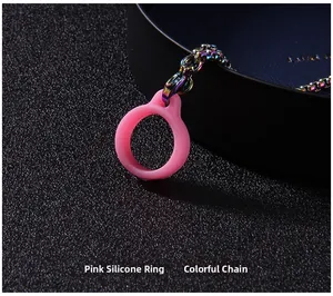 Detail of pink silicone loop and iridescent metal chain for electronic devices