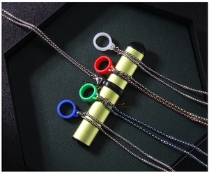 Macro shot of colorful silicone rings with metallic chains for electronic vaporizers