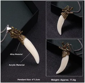 Detailed macro view of vintage dragon head pendant with acrylic wolf tooth charm and chain