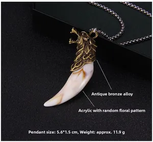 Detailed view of bronze wolf head necklace with 5.6x1.5cm acrylic tooth pendant