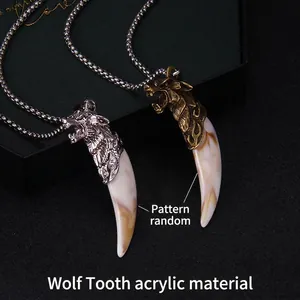 Wolf head pendant necklace in silver and bronze finish with acrylic faux tooth