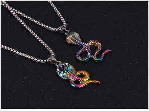 Macro detail of iridescent rainbow cobra pendants on square box chains for men