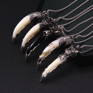 Retro wolf fang necklace set in vintage silver finish with diverse stone textures