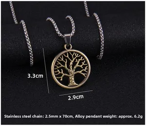 Detailed close-up of hollow vintage Tree of Life pendant with stainless steel chain