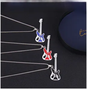 Detailed macro view of electric guitar necklaces in red, blue and black enamel finish