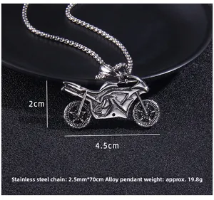 Close-up of vintage biker motorcycle pendant with dimensions 4.5x2cm and 70cm chain