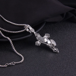 Vintage punk stainless steel necklace featuring a cross pendant with prayer hands engraving