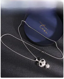Detailed view of a cute panda pendant necklace featuring sparkling white rhinestones on a silver chain