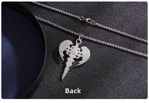 Detailed back view of silver gothic sword pendant with angel wings and cross