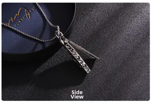 Side view of gothic silver coffin pendant necklace with intricate engraved leaf patterns