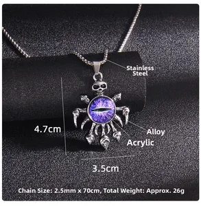 Detailed close-up of Gothic skull pendant with purple eyeball on stainless steel chain