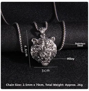 Detailed view of silver tiger head pendant showing dimensions 4.6cm by 3cm and steel chain