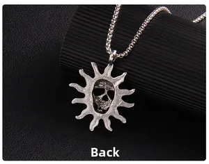 Detailed back view of vintage flame skull pendant necklace in silver stainless steel