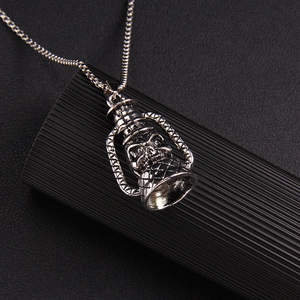 Vintage silver skull lantern pendant necklace in gothic punk style with link chain