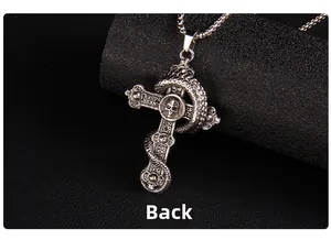 Back view of vintage punk cross pendant with dragon snake and skull metal details