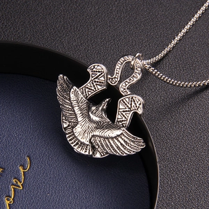 Vintage silver eagle pendant necklace in stainless steel with detailed feather texture