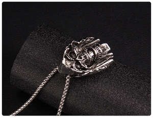 Macro shot of gothic skull pendant with vintage silver finish and durable box chain